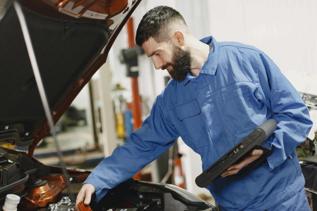 Diagnostic scanner in use at Michael and Sons Auto garage Dublin